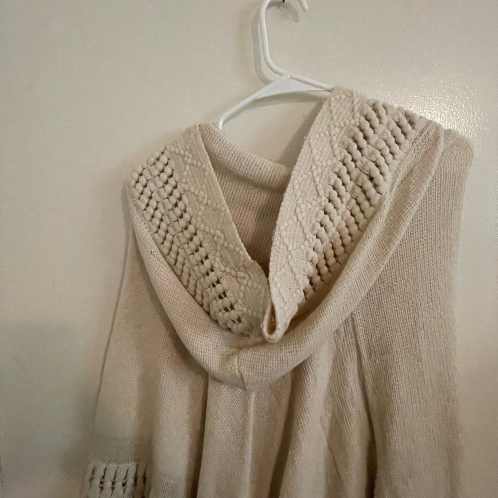 Cream Colored Wool Woven punchy with hood.